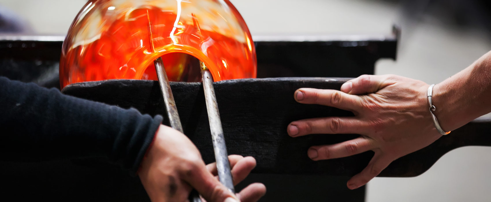 glass blowing in action, history of glass